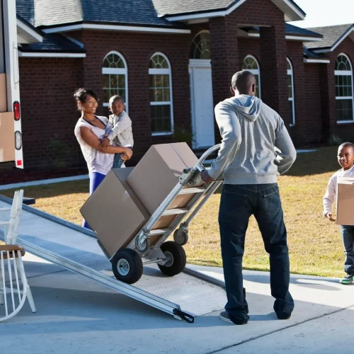 man taking bag into the truck