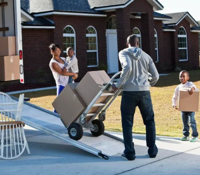 man taking bag into the truck