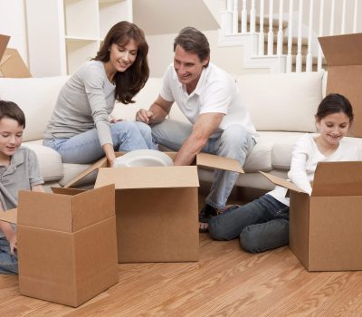 family packing the boxes