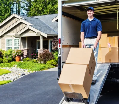 man coming out of the van with boxes