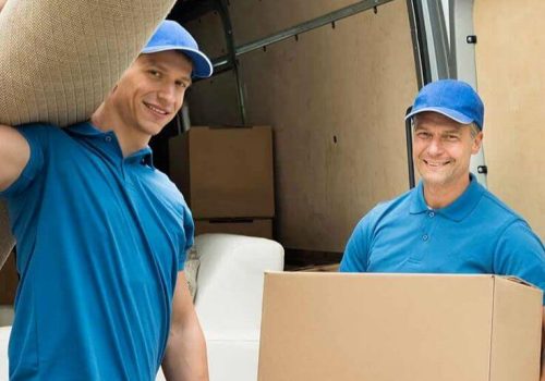 man holding boxes